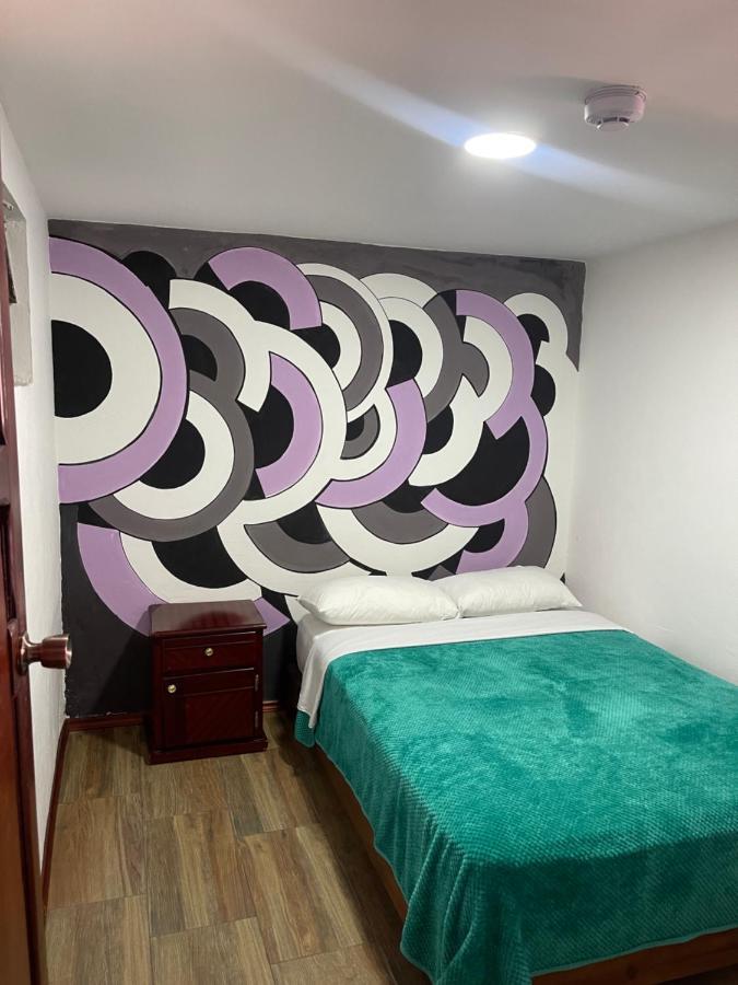El Jardin Escondido Party Hostel Banos  Bagian luar foto